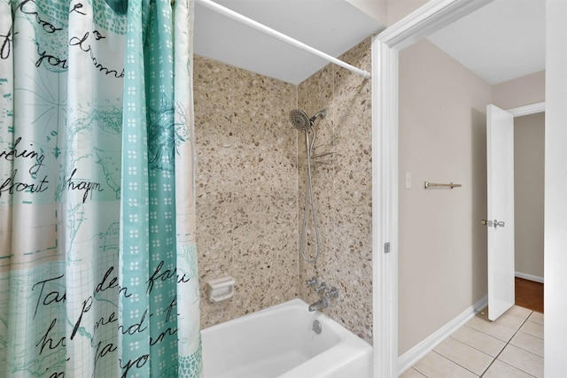 bathroom featuring shower / bath combination with curtain and tile patterned floors