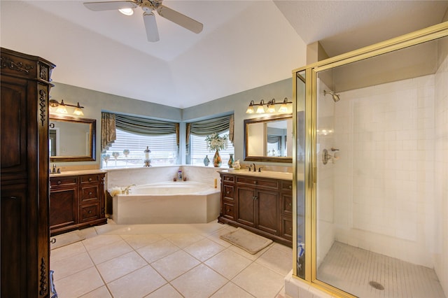 bathroom with tile patterned floors, vanity, and independent shower and bath