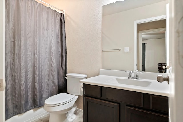 full bathroom featuring vanity, toilet, and shower / bath combo with shower curtain