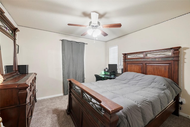 bedroom featuring ceiling fan and carpet floors