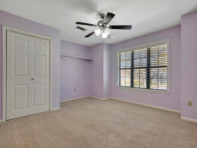 502 Crown Colony Dr, Lufkin, TX 75901 - unfurnished bedroom with carpet flooring, baseboards, ceiling fan, and a closet