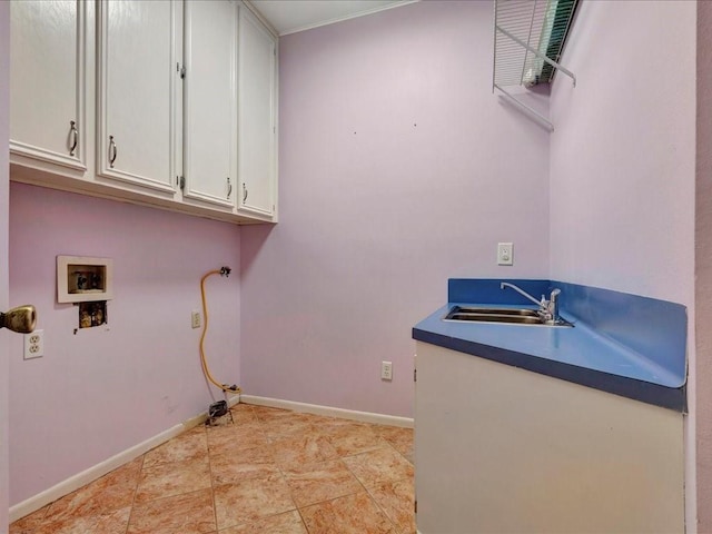 502 Crown Colony Dr, Lufkin, TX 75901 - laundry area with cabinet space, baseboards, and washer hookup