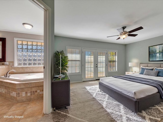 502 Crown Colony Dr, Lufkin, TX 75901 - tiled bedroom featuring access to outside, french doors, and ceiling fan