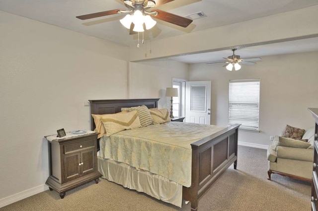 bedroom featuring ceiling fan and light colored carpet