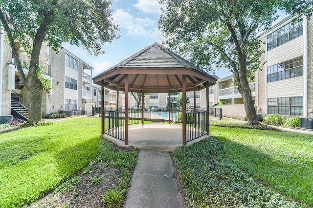 view of community with a gazebo and a yard