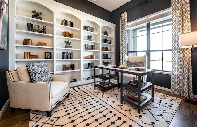 sitting room featuring hardwood / wood-style floors