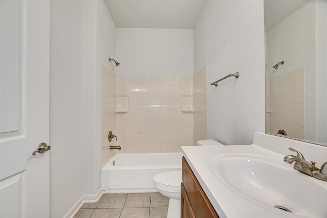 full bathroom featuring toilet, vanity, tile patterned floors, and tiled shower / bath