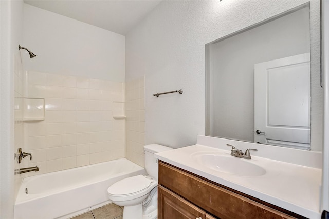 full bathroom with tile patterned floors, vanity, toilet, and shower / washtub combination