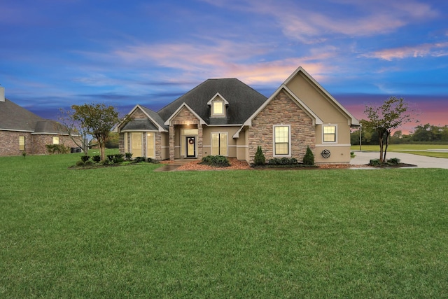 view of front of house with a lawn