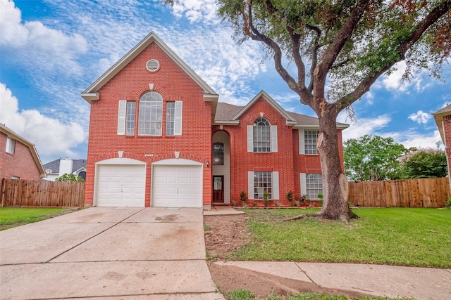 view of front property featuring a garage and a front lawn