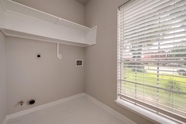 laundry area with carpet, electric dryer hookup, gas dryer hookup, and hookup for a washing machine