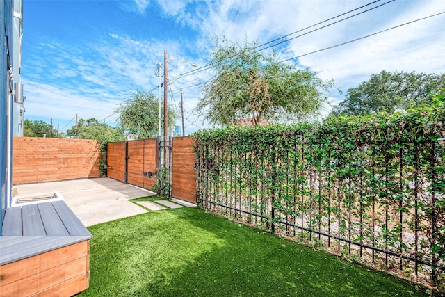 view of yard with a patio area and fence