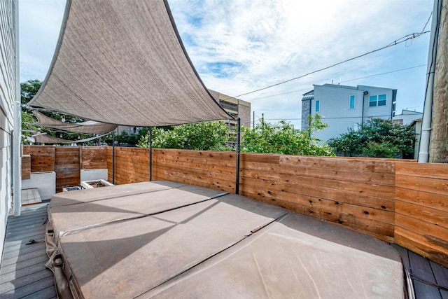 view of patio / terrace featuring fence