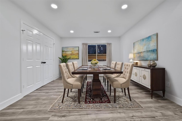 dining space featuring light hardwood / wood-style flooring