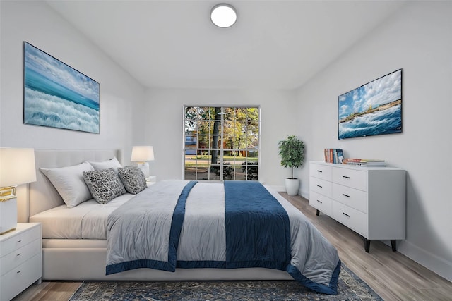 bedroom with light hardwood / wood-style floors