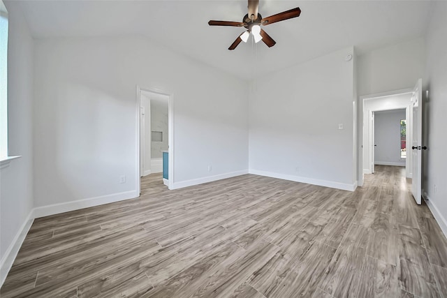 unfurnished room with ceiling fan and light wood-type flooring