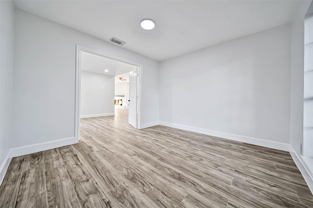 unfurnished room with light hardwood / wood-style flooring