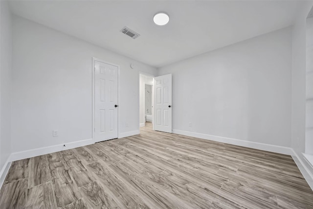 empty room featuring light wood-type flooring