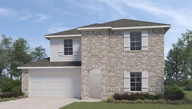 view of front of house with a front yard and a garage