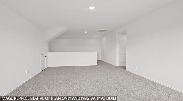 additional living space with light carpet