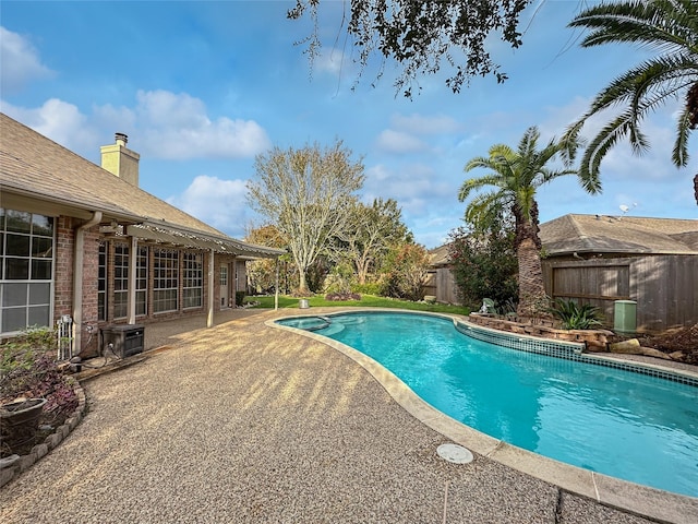 view of pool featuring a patio