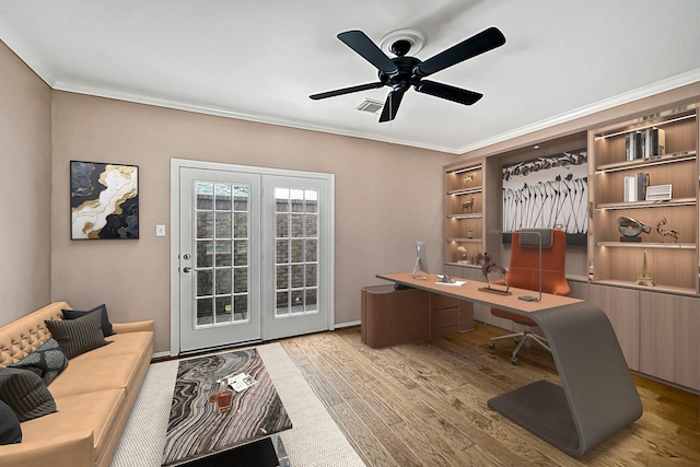 office space featuring ceiling fan, wood-type flooring, and ornamental molding