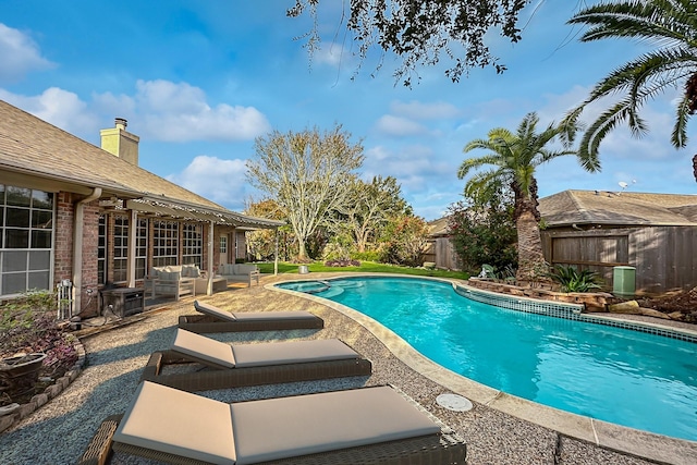 view of swimming pool featuring a patio area