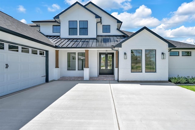 view of front of property with a garage