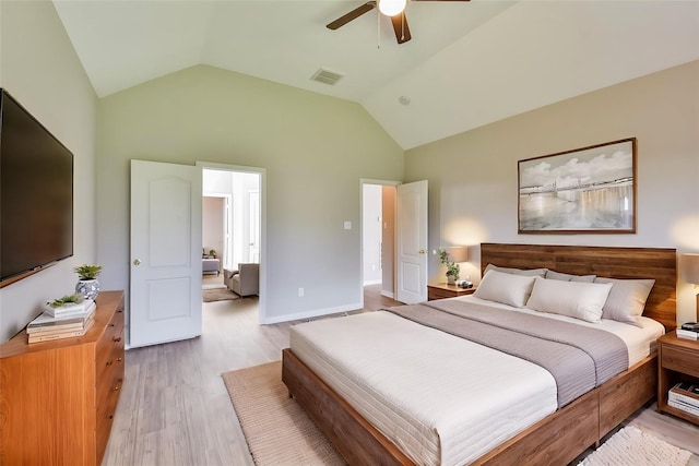 bedroom with high vaulted ceiling, ceiling fan, and light wood-type flooring