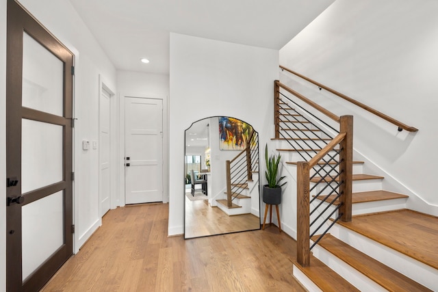 foyer with light wood-type flooring