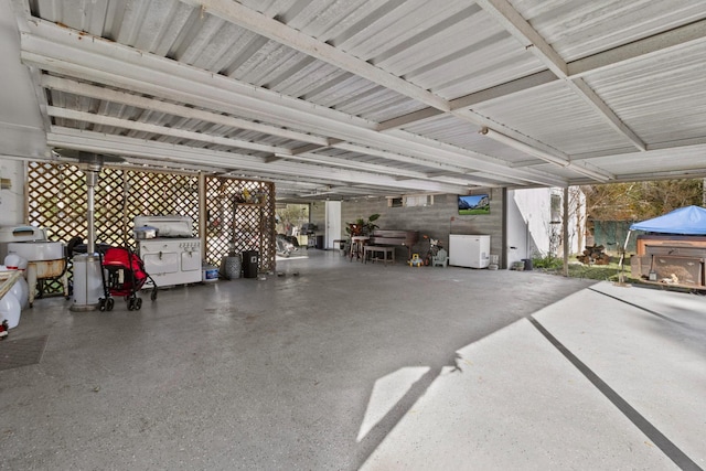 garage featuring refrigerator