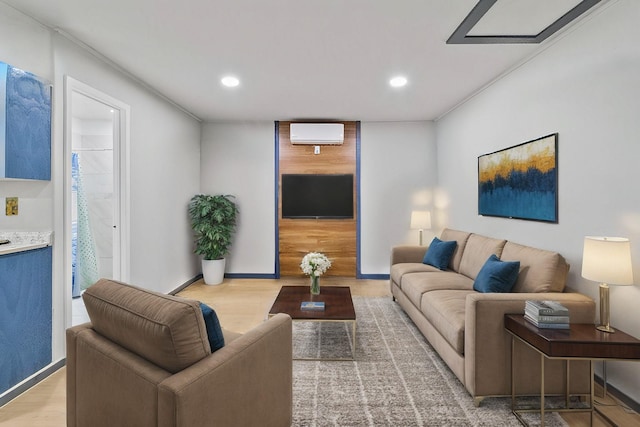 living room featuring a wall mounted AC and wood-type flooring