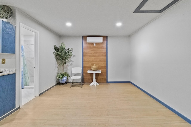 corridor featuring light hardwood / wood-style floors and a wall mounted air conditioner