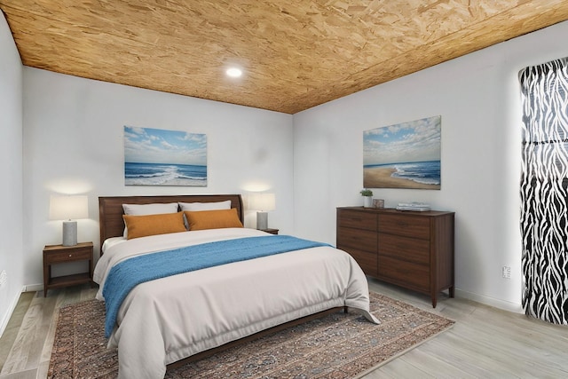 bedroom with light wood-type flooring