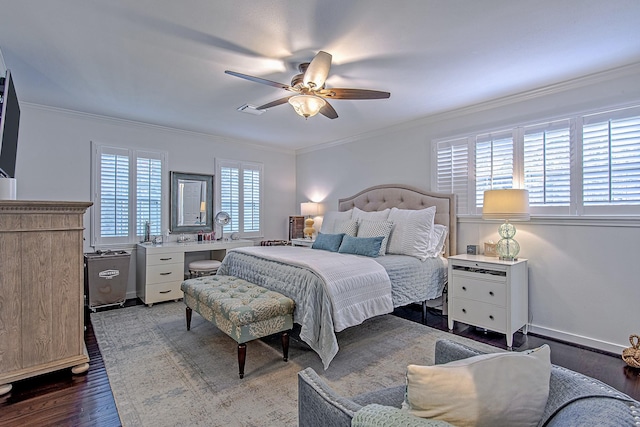 bedroom with ceiling fan, crown molding, and dark hardwood / wood-style floors