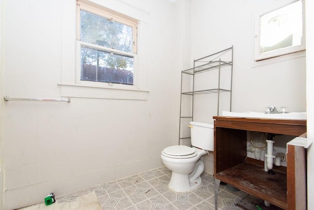 bathroom with tile patterned floors and toilet