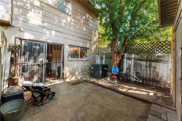 view of patio with central AC