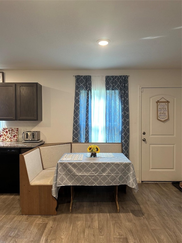 dining area featuring hardwood / wood-style floors