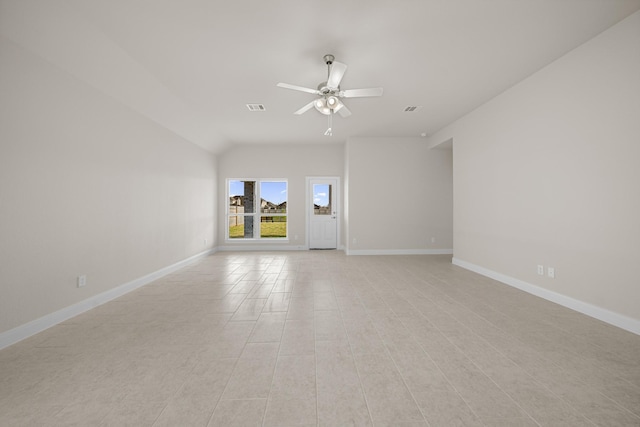 unfurnished living room with visible vents, ceiling fan, and baseboards