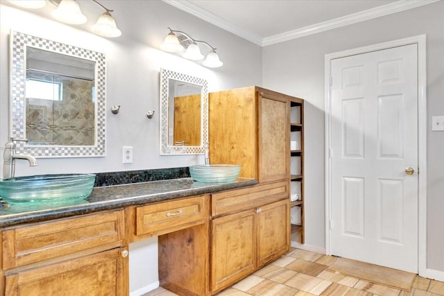 bathroom featuring vanity, tile patterned floors, and crown molding