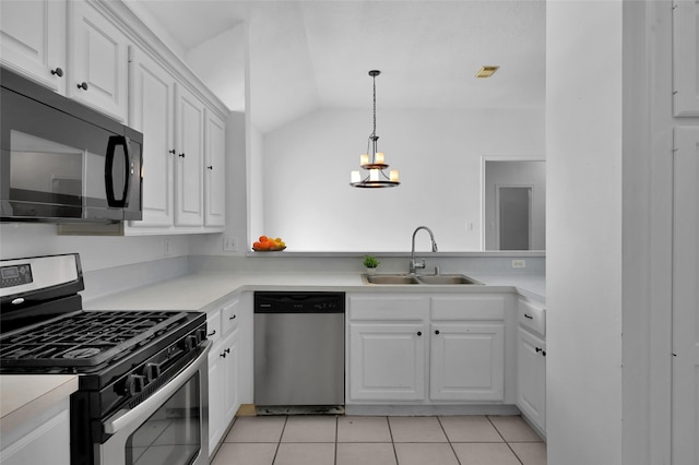 kitchen featuring white cabinetry, sink, and appliances with stainless steel finishes