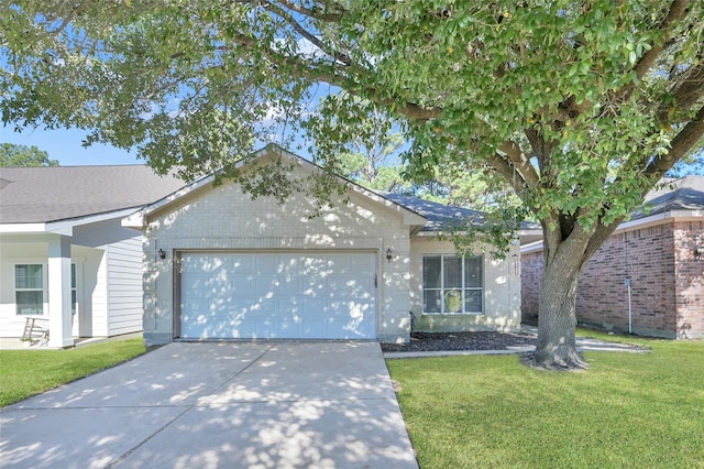 ranch-style home with a front yard and a garage