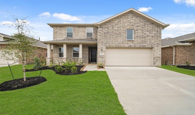 front facade with a garage and a front lawn