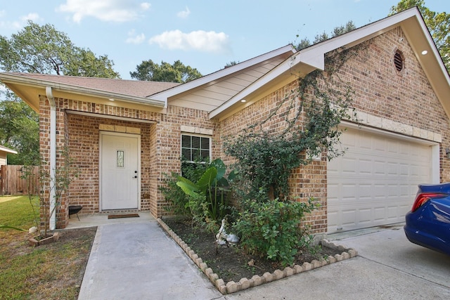 single story home with a garage