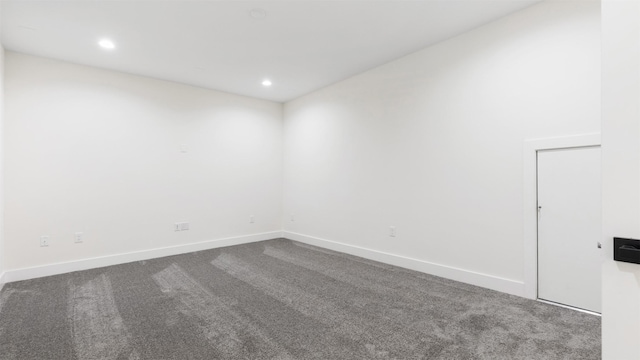 empty room featuring carpet flooring