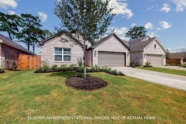 view of front of property featuring a front yard and a garage