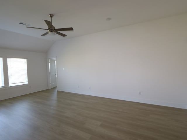 8622 Sun Coral Dr, Cypress, TX 77433 - spare room with a ceiling fan, wood finished floors, visible vents, and vaulted ceiling