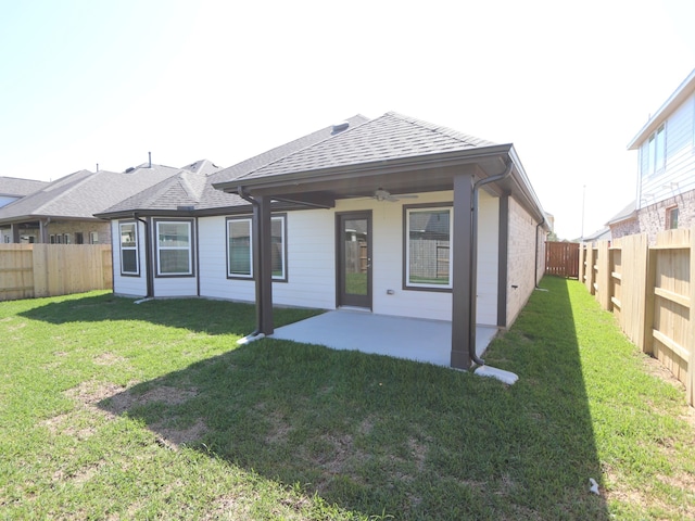 8622 Sun Coral Dr, Cypress, TX 77433 - rear view of house featuring a lawn, a patio area, ceiling fan, and a fenced backyard