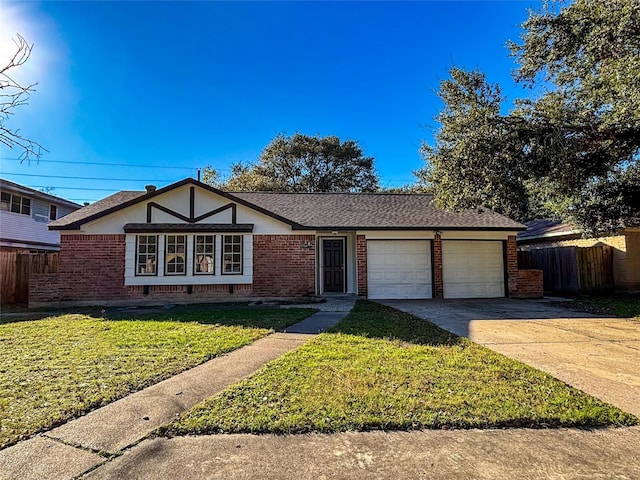 view of front of home featuring a front lawn and a garage