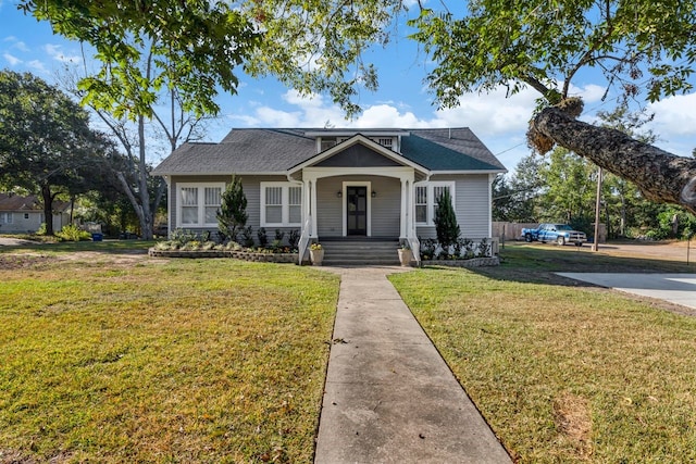 bungalow with a front lawn